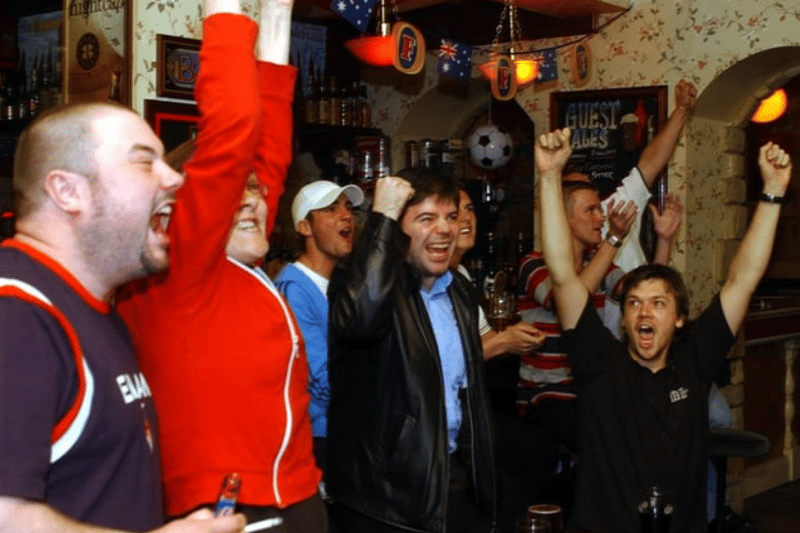 A happy 2004 scene at the Waterfront where England fans were watching their team in action against Switzerland. 