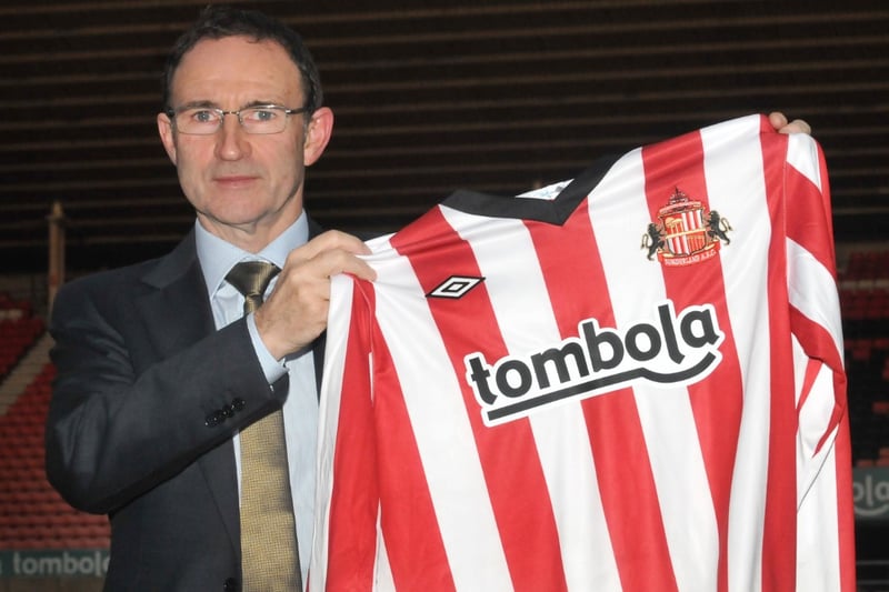 Martin O'Neill poses for photos on his first day at Sunderland in 2011.