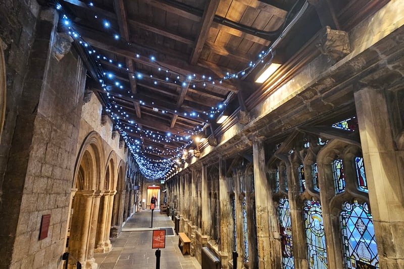 Christmas trees and fairy lights decorate the Cathedral.
