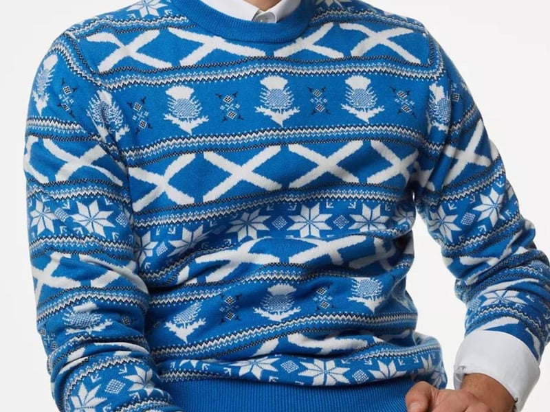 This offering from Marks & Spencer combines patriotic symbols of Scotland - namely saltires and thistles - with festive snowflakes.