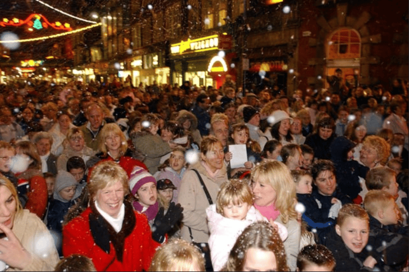 A winter wonderland as snow falls on the 2004 Christmas lights ceremony.