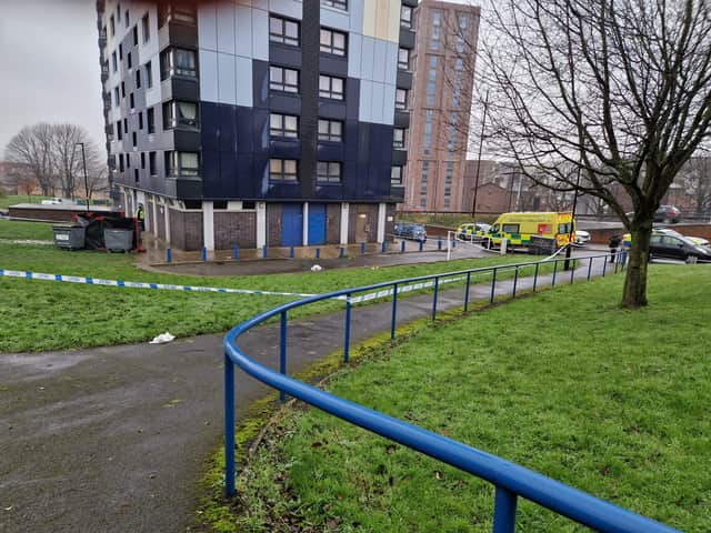 A police cordon in place after a 37-year-old woman was tragically found dead at the foot of a tower block on Brightmore Drive, in the Netherthorpe area of Sheffield, on December 7, 2023