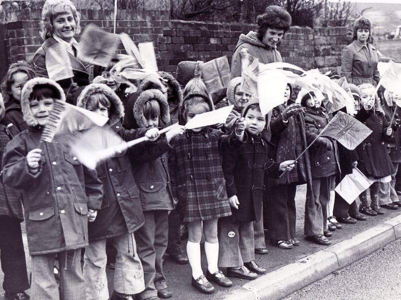 Children waiting patiently in the cold to see Prince Charles, as he was then, on his visit to Sheffield in December 1975