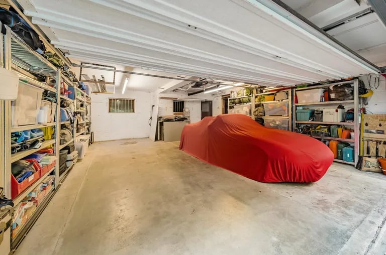 The large garage is ideal for multiple vehicles and storage.