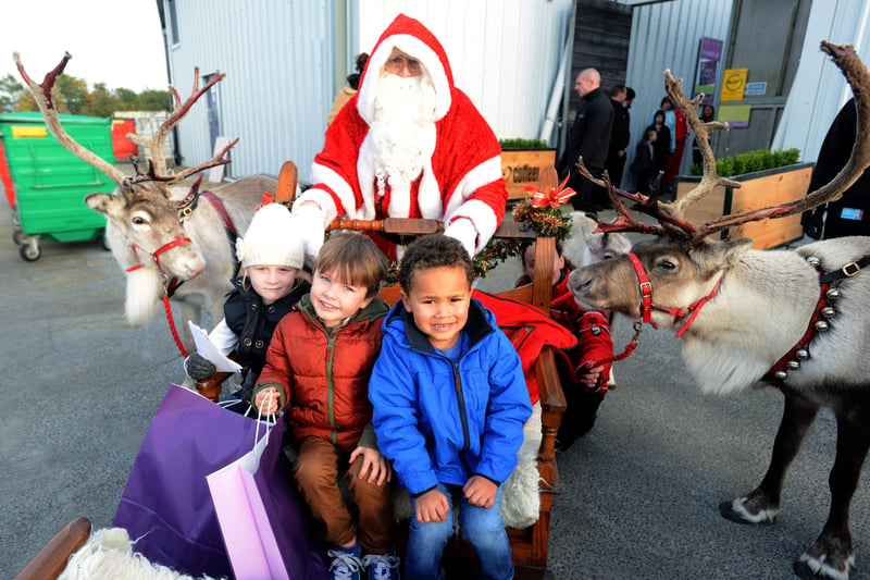 Rosie Mellor, Sonny Hounslow and William Carson  got to meet Santa and his reindeers at Dalton Park in 2013.