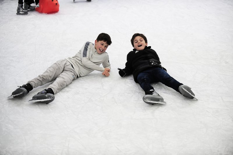 Happy ice skaters enjoying the rink at White Rose.