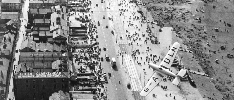 Seen from the top of Blackpool Tower a Miles Hawk trainer plane piloted by flying officer H.R.A Edwards reaches the turning point of the King's Cup Race
6th September 1935