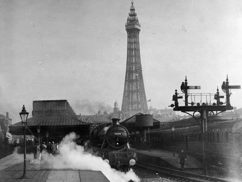 9th July 1934:  The Fylde Coast Express leaving Blackpool Station on its inaugural trip to London. Blackpool Tower is in the background.  (Photo by E. Dean/Topical Press Agency/Getty Images)
