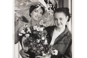 Birmingham City Council were planning to enter the Britain in Bloom competition for the first time ever, and actors from the show helped to put up the first hanging basket in the Chinese Quarter. The photograph from March 24, 1992 shows Karen Halliday and Melanie Thomas of Quinton Road in Harborne. 