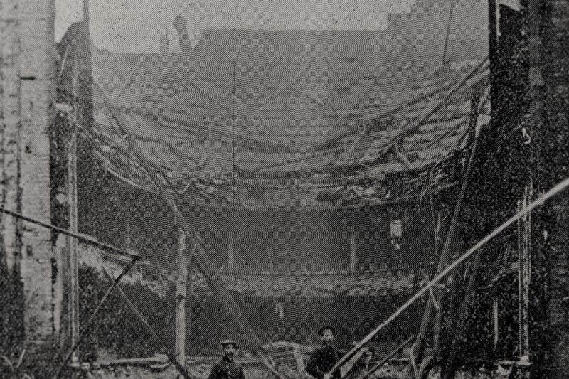  The photograph shows the collapse of the Theatre Royal Newcastle upon Tyne after the fire on 23/11/1899. Two firemen are standing amid the ruins of the building.Theatre Royal opened in 1837. It was rebuilt after the fire re-opening in 1901.