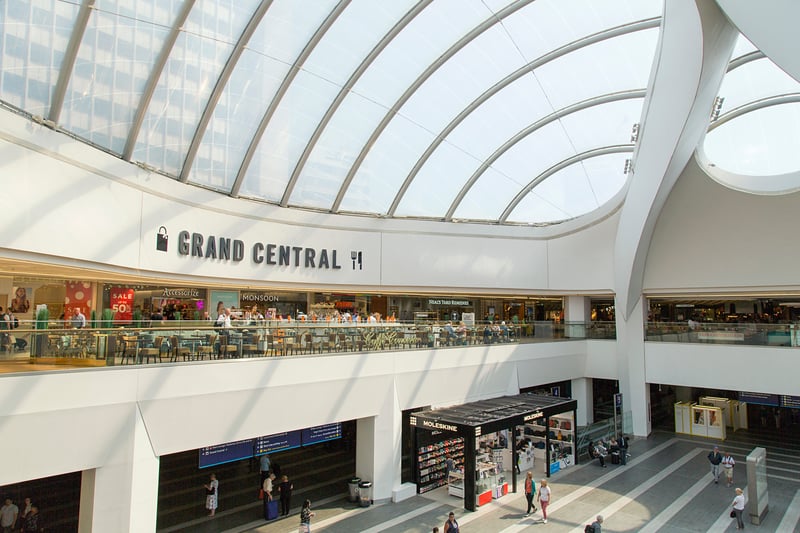 A modern designed gateway to the city, a hub for transportation and shopping. Brummies commute, travel, and explore, enjoying the convenience and the connections of Birmingham.