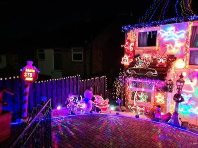 Sarah's household has gone all out with their light display, where LED tubes show bells, stars, gingerbread men, a car, a sleigh, and just about anything else Christmassy that you could imagine. We are sure Santa won't be missing this house!