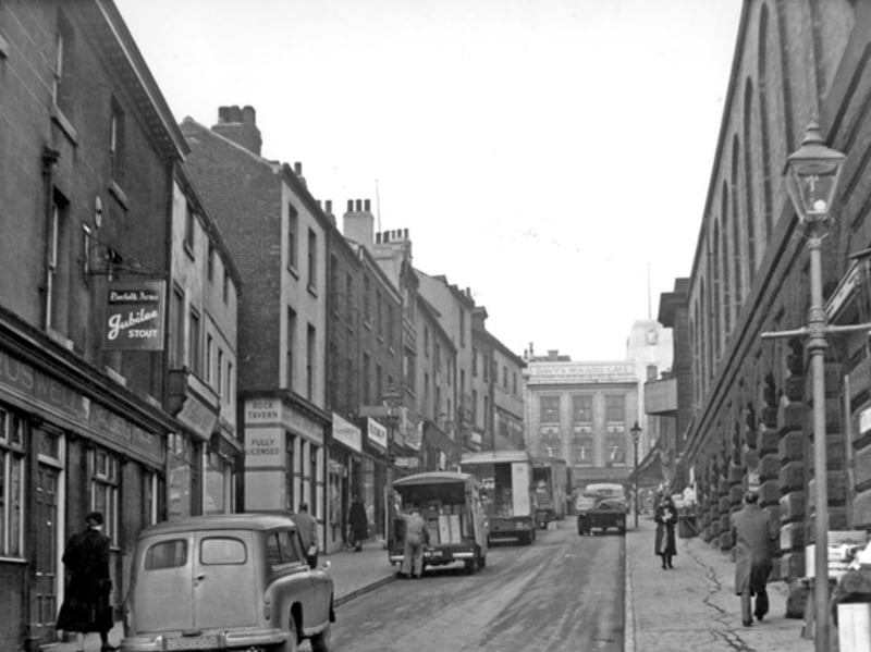 Dixon Lane, Sheffield, pictured on January 1, 1957, looking towards Haymarket. The Norfolk Arms pub and  Rock Tavern can be seen on the left, with the Norfolk Market Hall to the right