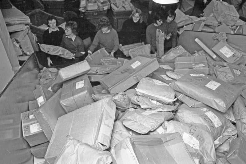 An insight into the vast piles of Christmas parcels at the William Street office in 1974.