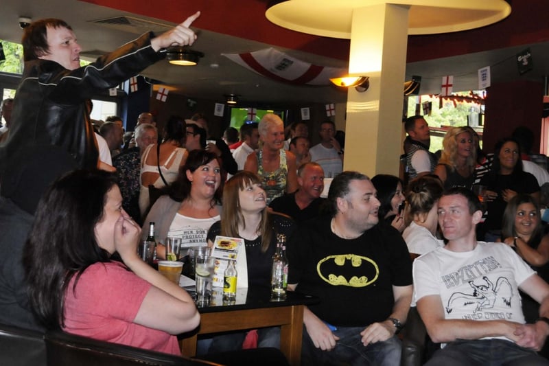 Fans watch the England V Italy match in 2012. See if there's someone you know among them.
