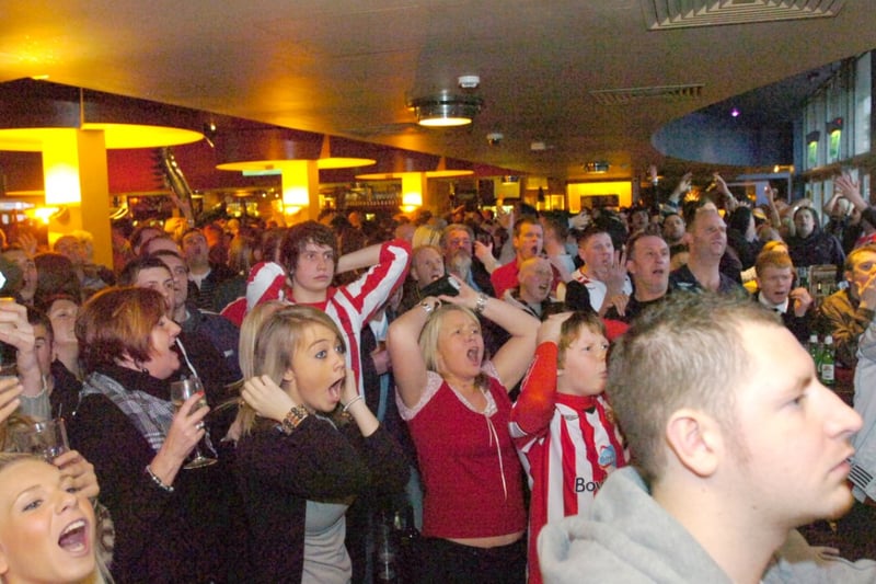 Frustrated fans watching the derby match at the pub in 2011.