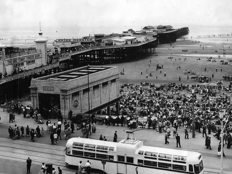 Central Pier, beach and lifeboat house. The Tommy Trinder show advertised on the pier