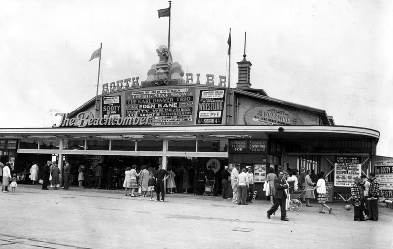 An exterior view of The Beachcomber, the  amusement centre at the South Pier in 1963.  Pier entertainment included The Sooty Show and Marty Wilde and the Wildcats. 'Dirty' Dominic Pye headlined the wrestling bill