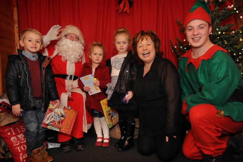 Visiting Santa and his Elf in his grotto in 2014 were Joshua Hodgkinson, three, Ruby Hill, three and her sister Harriet, five.
They were joined by Karen Maclennan from Grace House.
