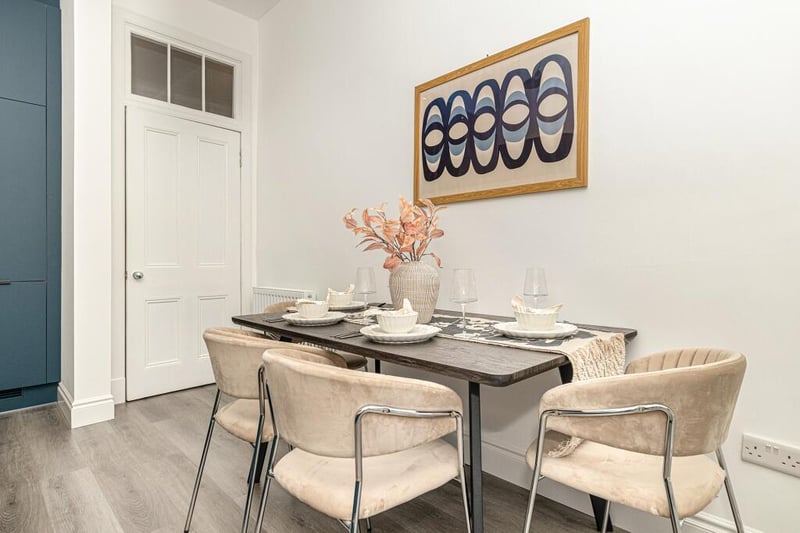 There is ample room in the kitchen for a dining table and chairs.