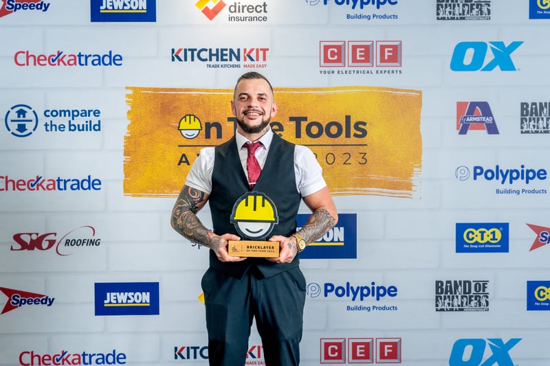 His outstanding craftsmanship with unmatched dedication has seen Brummie builder Ash Mahoney named Bricklayer of the Year at the 2023 On The Tools Awards.
Ash, the proprietor of Birmingham based construction company Mahoney Brickworks, dedicated his award to fellow brickie Richie Maxwell who passed away earlier this year and was known to many as ‘the Blonde Brick'. A satisfied customer hailed Ash in his awards entry as “the best in the trade”, citing his consistently exceptional work and unparalleled work ethic. 