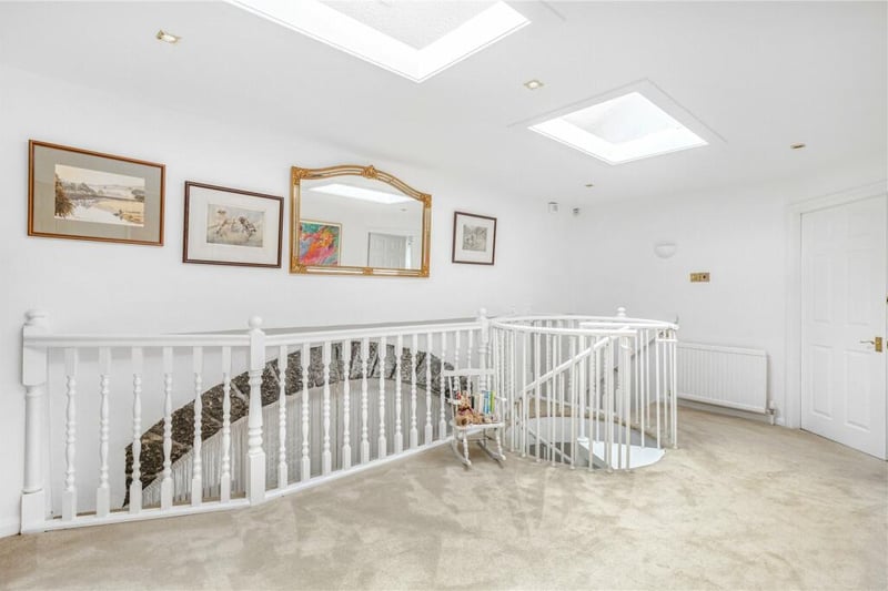 Stairs lead to this gallery landing with access to all first floor rooms.