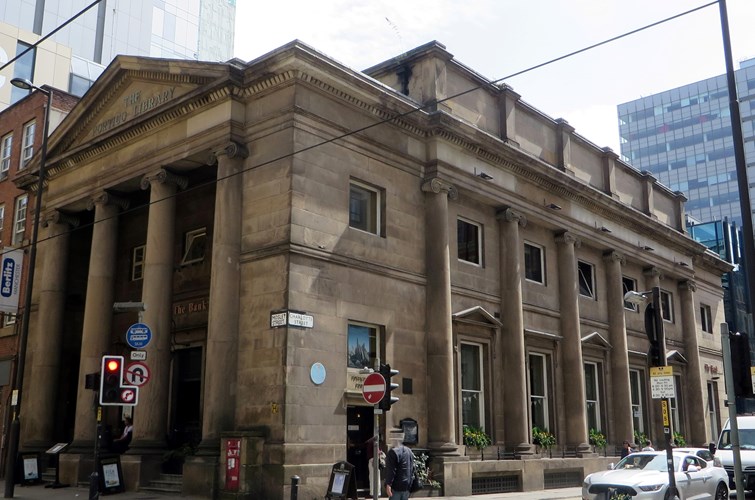 Originally built in 1803 to house the Portico Library and said to be Manchester's earliest Greek Revival building, The Bank is Grade II* listed and sits on the corner of Charlotte Street and Mosley Street.

The Portico Library is still in evidence on the upstairs floor. The public house occupies the ground floor, which was the newsroom, with the open-plan interior retaining many original features.