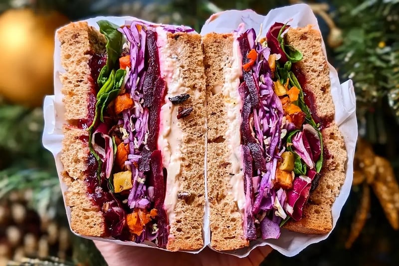 The popular sandwich shops have a festive sandwich with ham, turkey, festive slaw, roasted carrots and parsnips, leaves, cranberry sauce and gravy mayo on white bloomer.