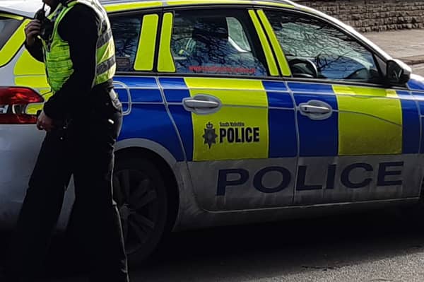 One child is in hospital after an altercation on a field near Ecclesfield School, Sheffield. File picture shows a police at an incident. Picture: David Kessen, National World