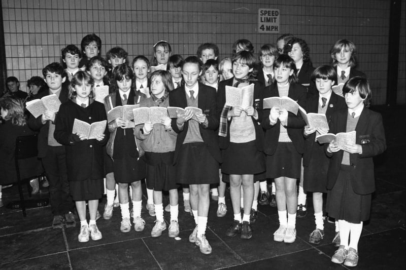 St Thomas Aquinas choir at Sunderland Bus Station in December 1984.
That's the year that Band Aid reached the top with Do They Know It's Christmas 