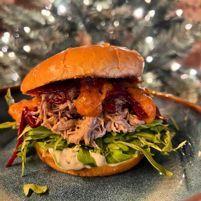 Homemade sandwich shop in Partick are offering overnight spiced pork shoulder, roasted garlic and herb mayo, rocket, braised red cabbage, crispy onions and apricot hot sauce in a roll