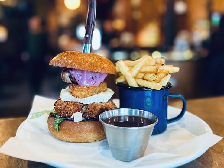 One of Glasgow's best neighbourhood bars, The Christmas special at The Thornwood is panko breaded turkey breast, pigs in blankets, hash brown, brie and cranberry mayo in a bun. Served with fries and a side of turkey gravy. 