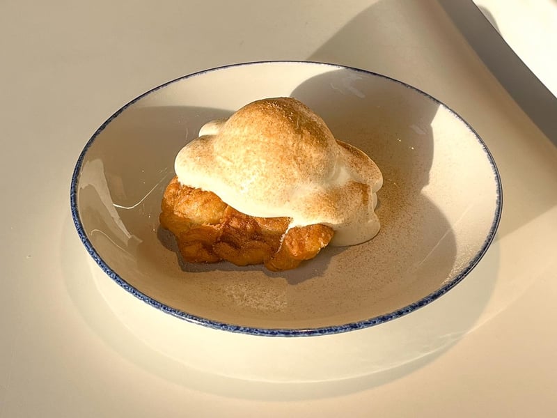A winter dessert: Deep fried mince pie topped with ice cream and a generous pour of brandy cream