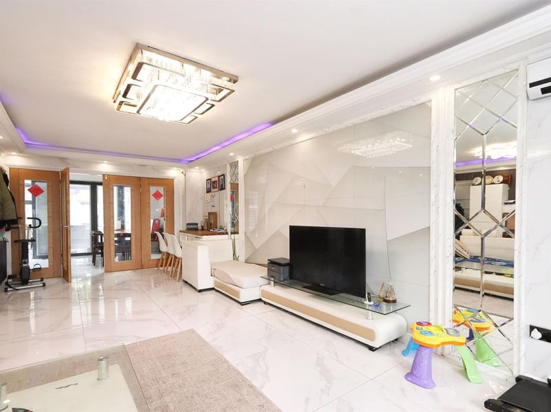 This huge, modern lounge is found just inside the front doors. (Photo courtesy of Zoopla)