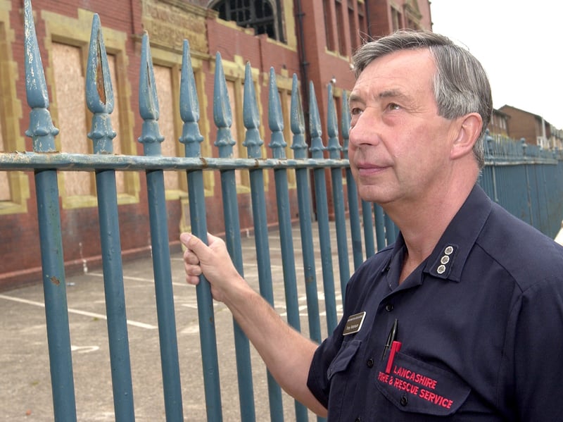 Fire Safety Officer Tony Robinson looks at the burnt out remains of Devonshire Road School. It was suggested that the school may have been saved in the fire if a sprinkler system had been fitted 