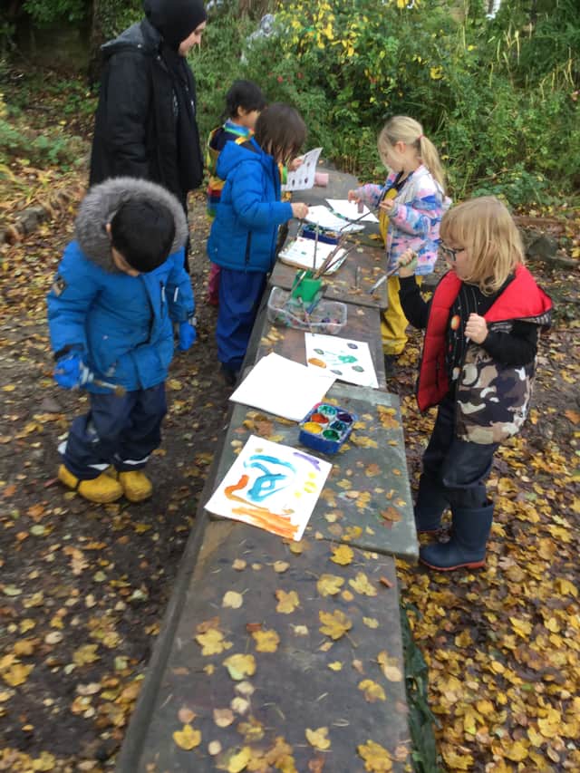 Little ones at Broomhill Infant School using their forest classroom. Ofsted praised how children had access to one day of "expert" learning outdoors each week.