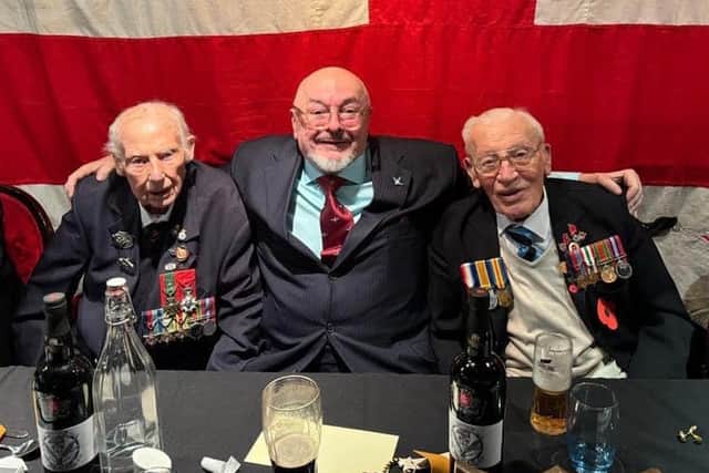 Royal Marine veteran Jack Quinn, Bruce Compton, and Roy Ashton, a WWII veteran and the longest-serving Blades fan.