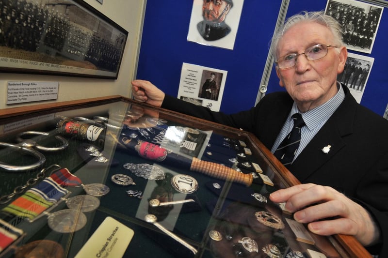 Harry Wynne alongside part of his collection of police memorabilia, which was on display at Sunderland Antiquarian Society in 2014.