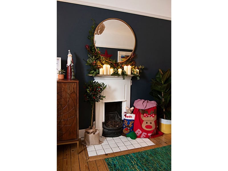 One couldn't think of a more welcoming fireplace for Santa Claus.