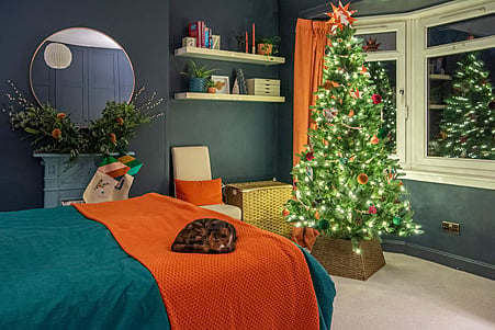 Even the bedrooms at Bay Tree House have Christmas trees.