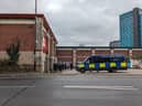 Riot police were captured breaking into Sheffield's former Office Outlet premises on Eyre Street. 