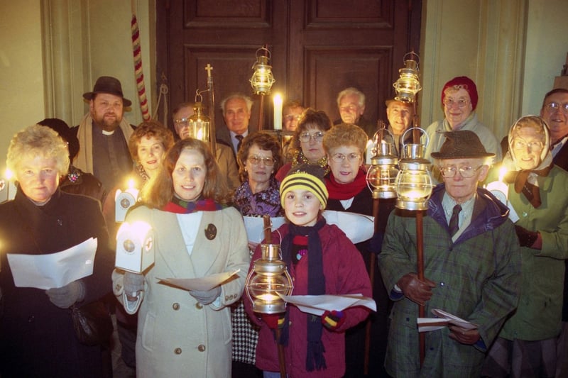 Eleven year old Fances Hazlett, from Hendon, prepares to entertain people of the alms houses around the Holy Trinity Church with the parishioners of the East End in 2000.
If you were listening to the charts that year, Bob The Builder and Can We Fix It? was number one.