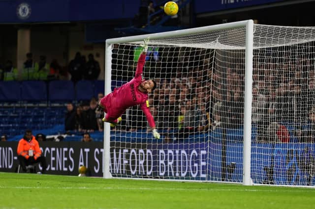 Was alert to deny Cole Palmer at his near post and made a big stop in the second half to keep out Raheem Sterling.