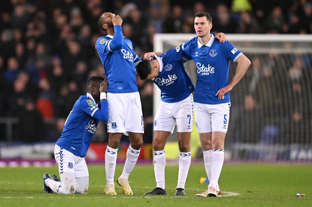 Players of Everton react after Amadou Onana of Everton (not pictured) misses their sides fifth penalty during the Carabao Cup Quarter Final match between Everton and Fulham at Goodison Park on December 19, 2023 in Liverpool, England. (Photo by Stu Forster/Getty Images)