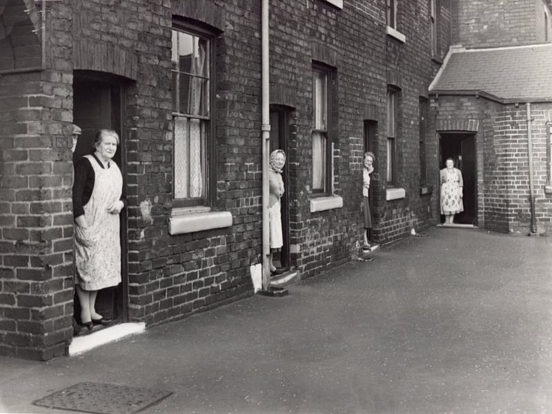 Looking out from the friendly row of terraced houses on Dunlop Street, Carbrook, Sheffield, where everyone knows what's going on and there is no room for secrets - Mr and Mrs David Bruce, Mrs Jean Jordan, Mrs Ellen Wragg and Mrs Maude Goodrum are pictured on February 9, 1962