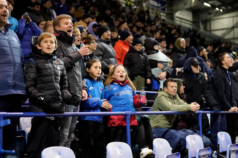 Young Pompey fans on their feet taking the game in. 