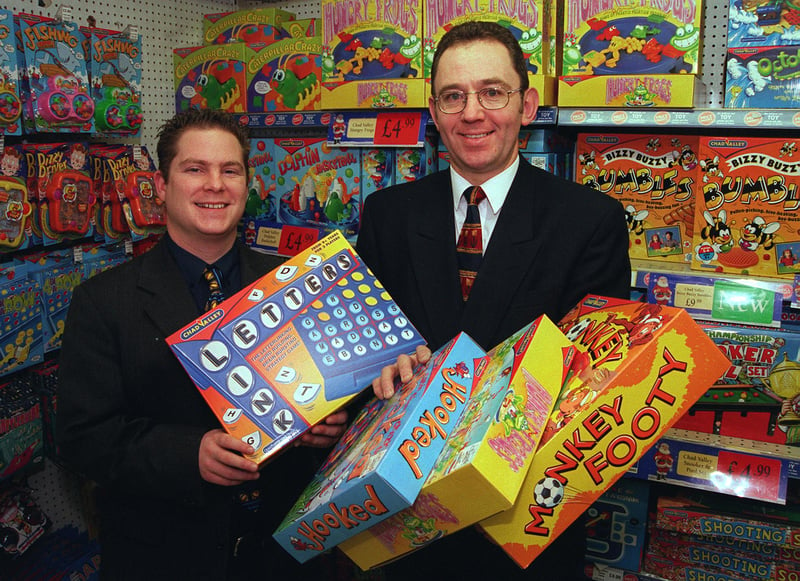 Woolworths on The Moor, Sheffield, where The Star Toy Appeal co-ordinator Graeme Dodd is seen receiving toys worth over £100 for the appeal, from Woolworths manager David Tiffany