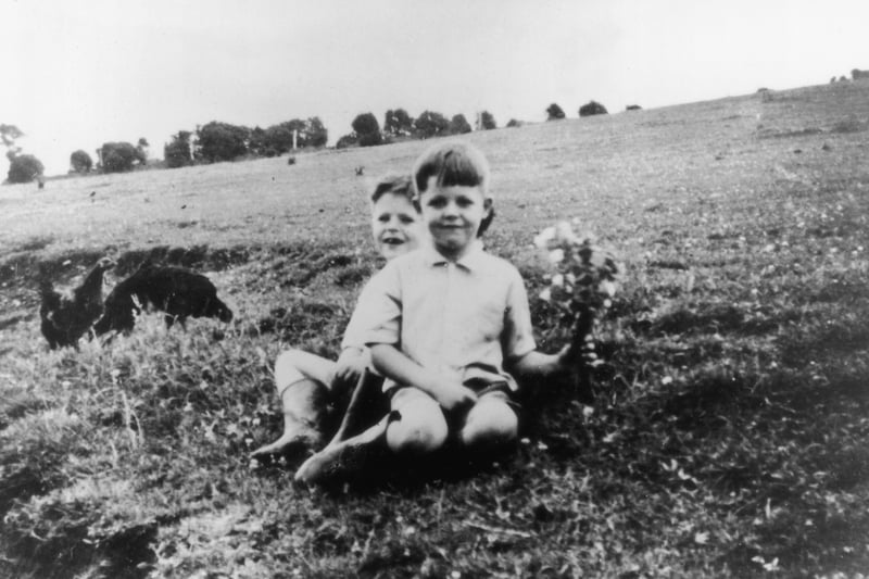 Beatle-to-be Paul McCartney in 1948, when he was aged just six. In this photo he is with his brother Mike, who was eight at the time.