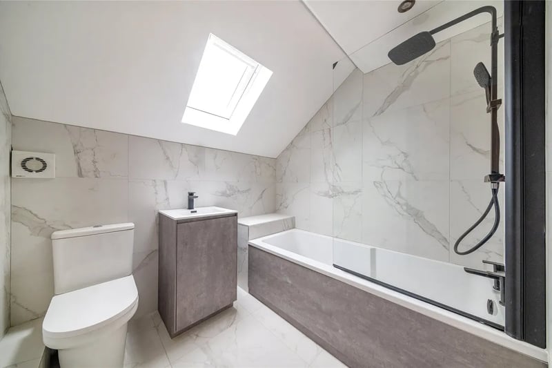 The house bathroom is a fully tiled three piece suite.