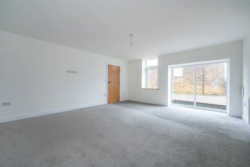 Completing the ground floor is an open lounge which can be used as a second reception room or a large bedroom.